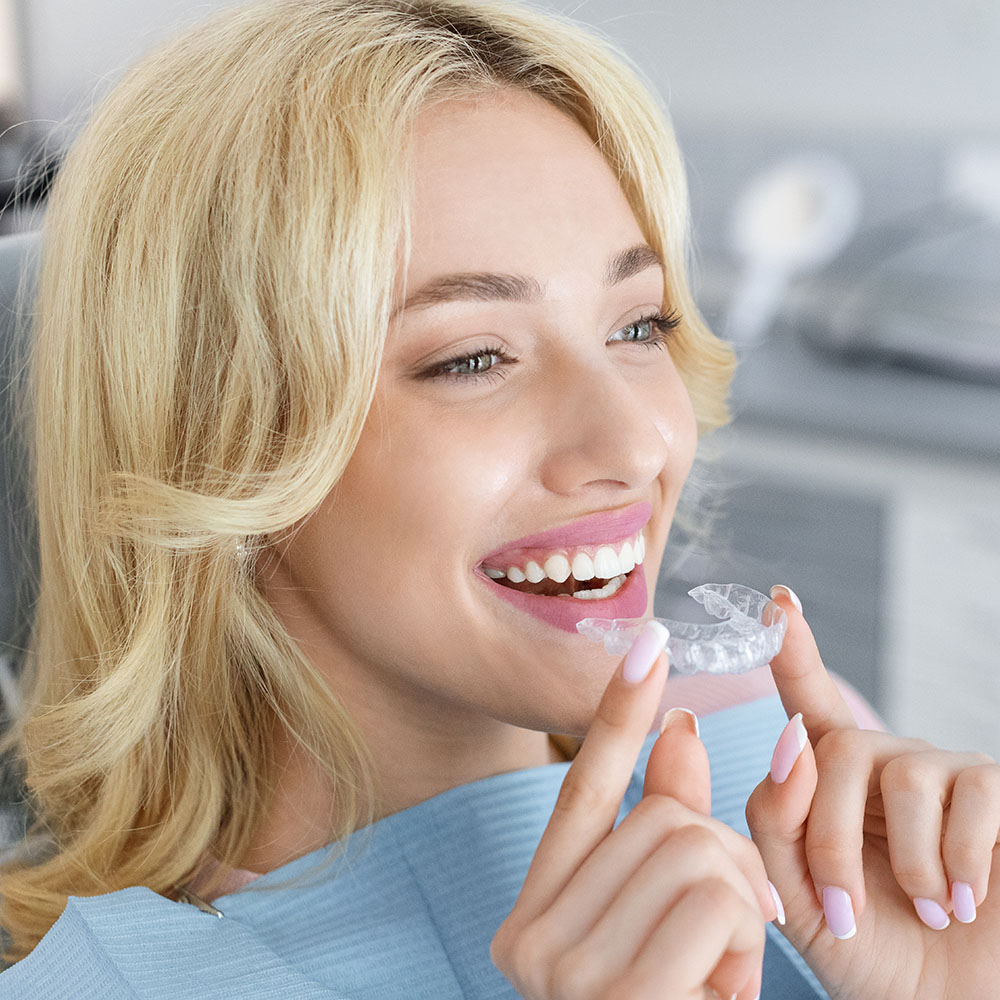 Levittown Smile Design | Dentures, Sports Mouthguards and Emergency Treatment